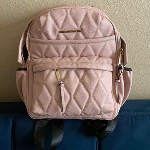 Pink Steve Madden backpack.